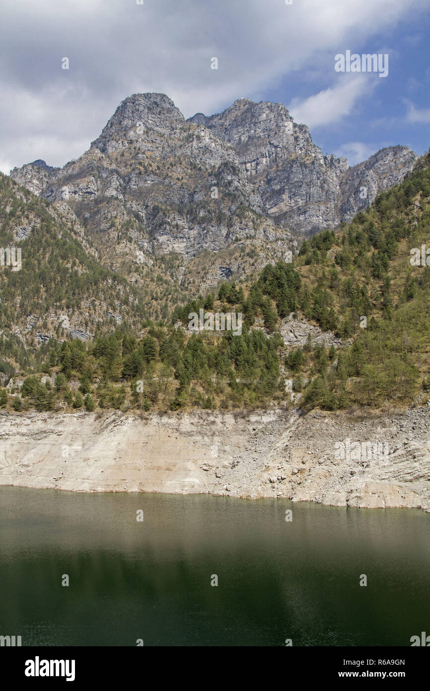 The Idyllic Lake Lago Di Selva With Its Imposing 111 M High Dam Is Located In The Friulan Dolomites Stock Photo