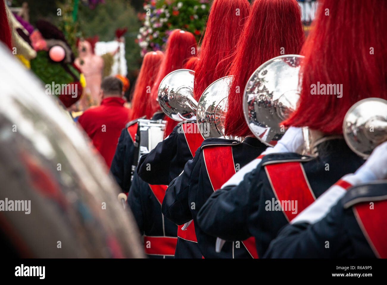 Various details of a performing wind band during a performance or