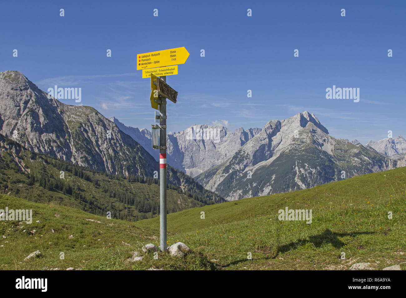 Hiking Guide With A View Of The Karwendel Mountains Seen From The Plimsjoch Stock Photo