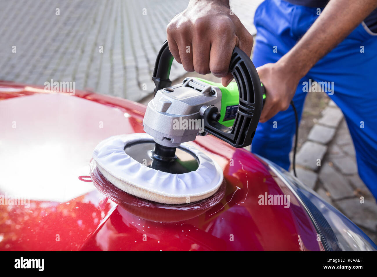 Hands Polishing Car With Orbital Polisher Stock Photo Alamy
