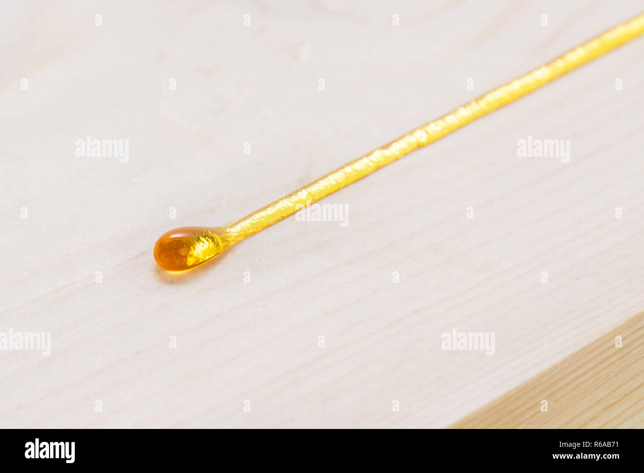 Sap oozing from pinewood Stock Photo