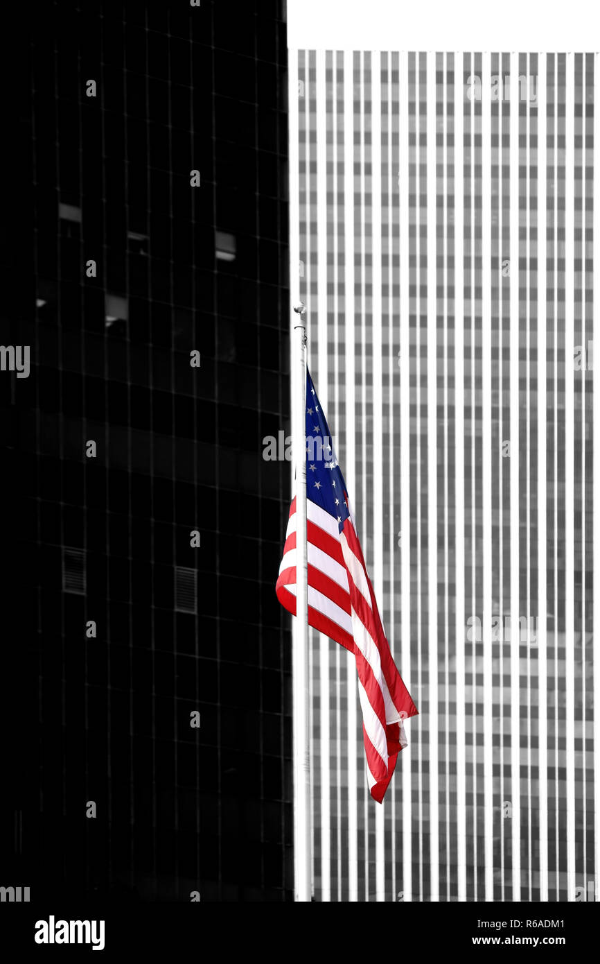 Flag In Front Of Modern Skyscraper Stock Photo