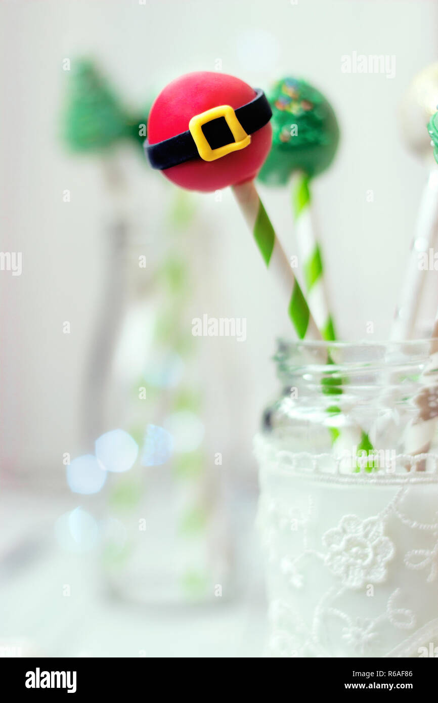 Christmas decorated cake pops; holiday background Stock Photo