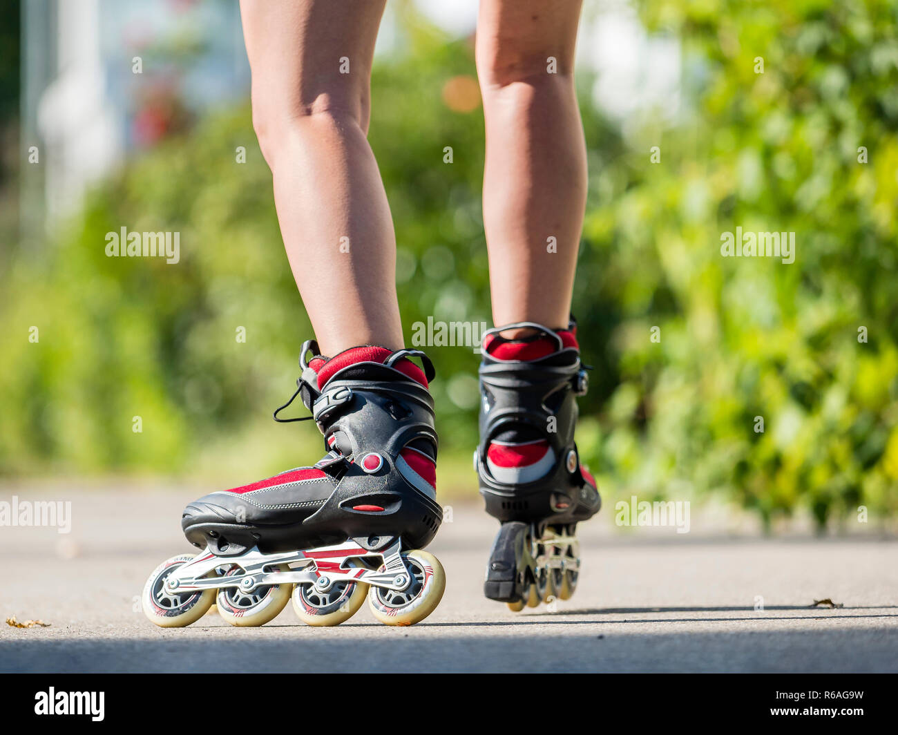 woman,20 years,inline skating,residential area Stock Photo
