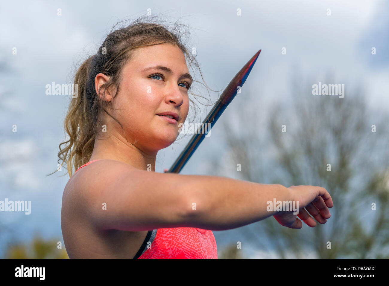 young woman javelin throwing in athletics Stock Photo Alamy