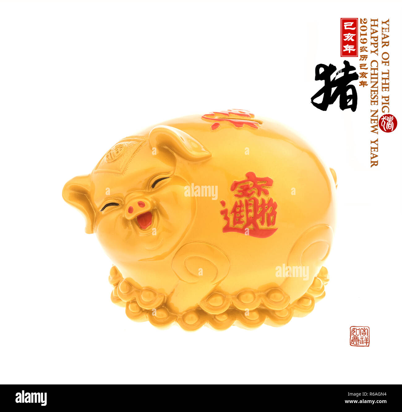 Gold piggy bank,Chinese calligraphy translation pig.Red stamps