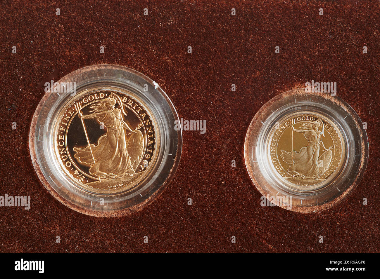 A proof Britannia two coin set on a red background. Stock Photo