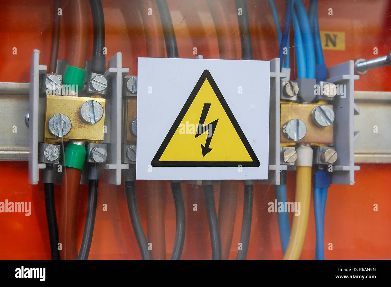 High voltage sign. Electrical relays and wires. Stock Photo
