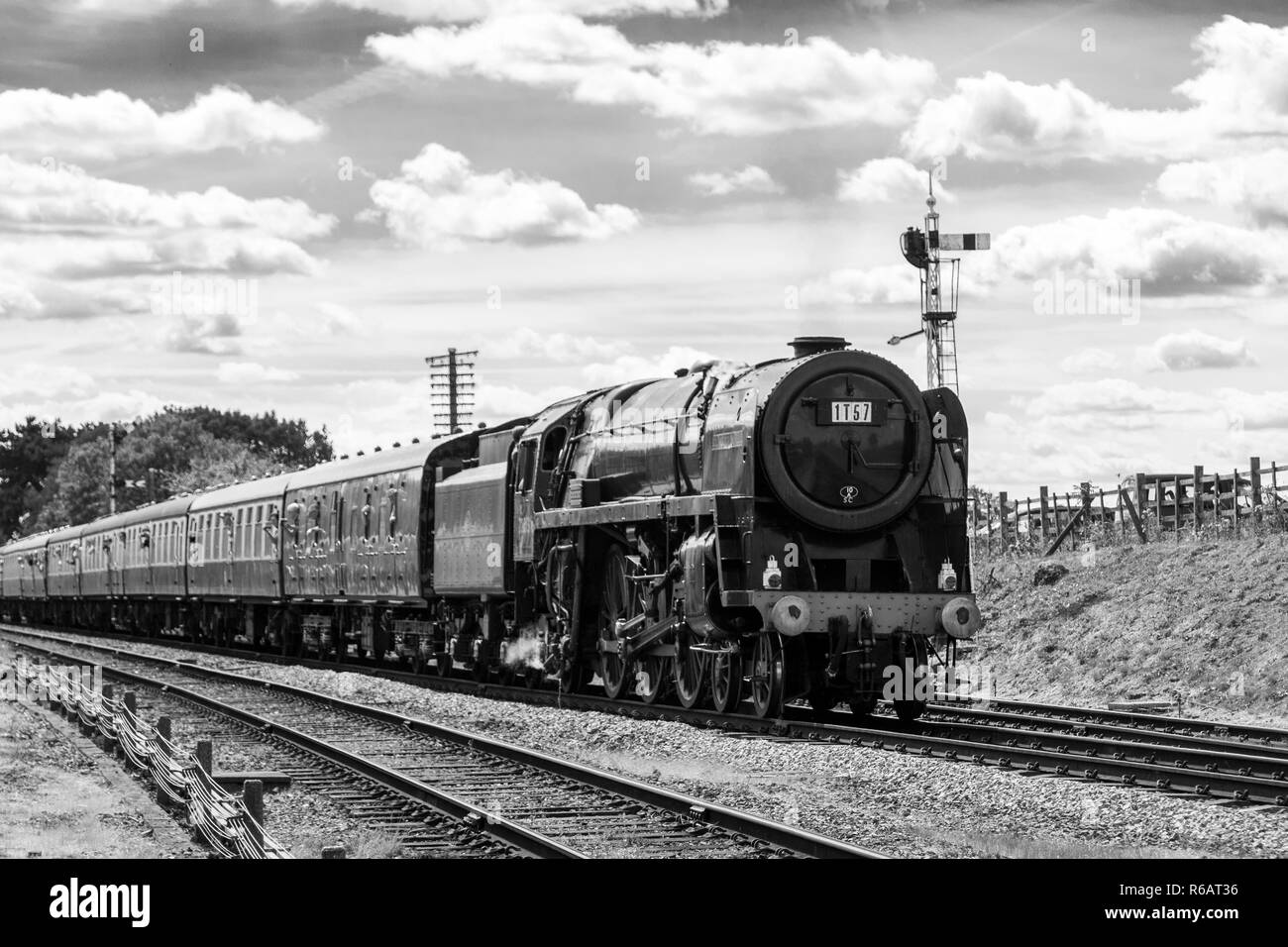 70013 Oliver Cromwell recreating the 15 Guinea Special at an event to mark 50 years since the end of steam on British Railways Stock Photo