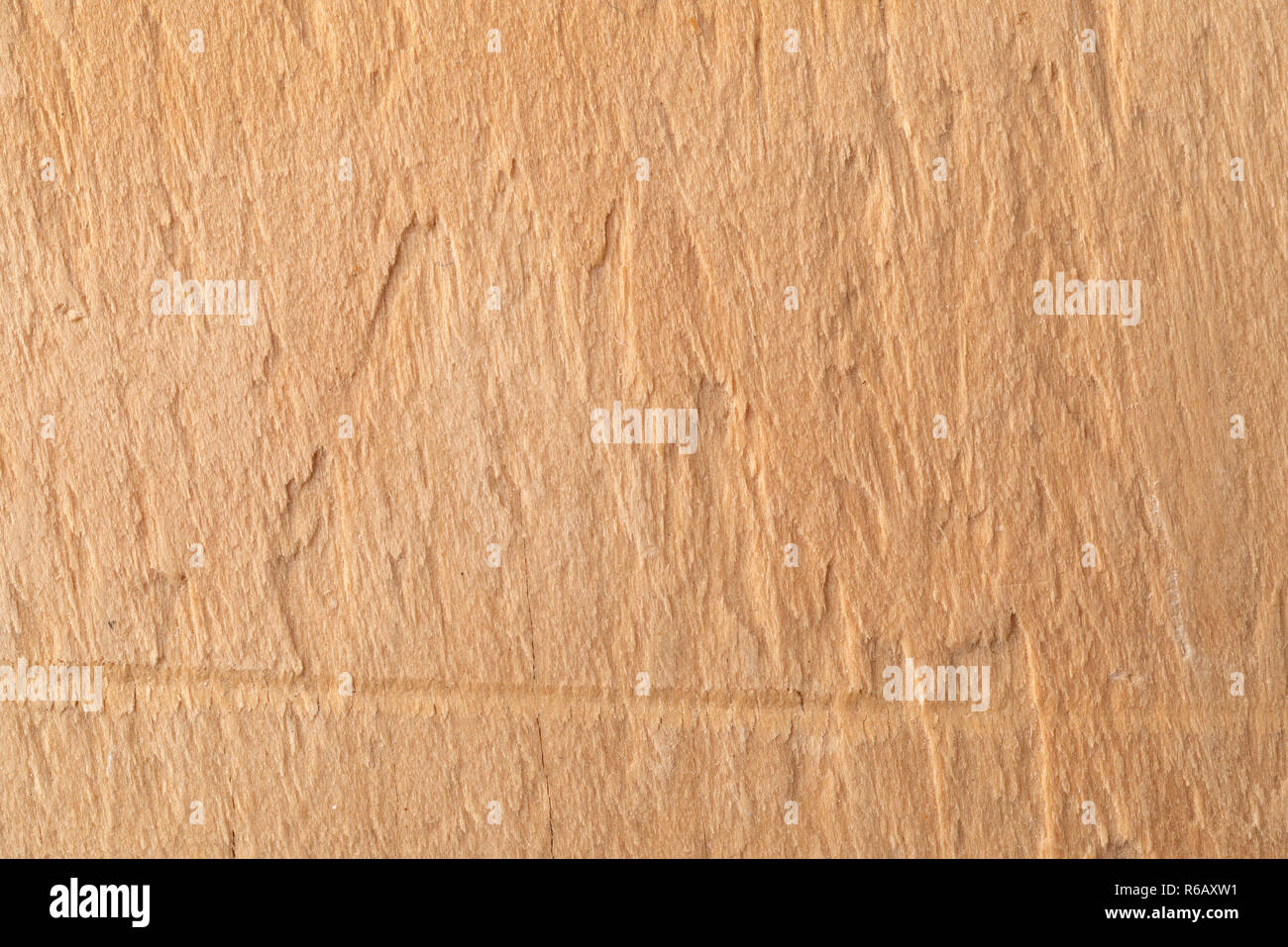 Close view of the surface of plywood with a scratch. Stock Photo