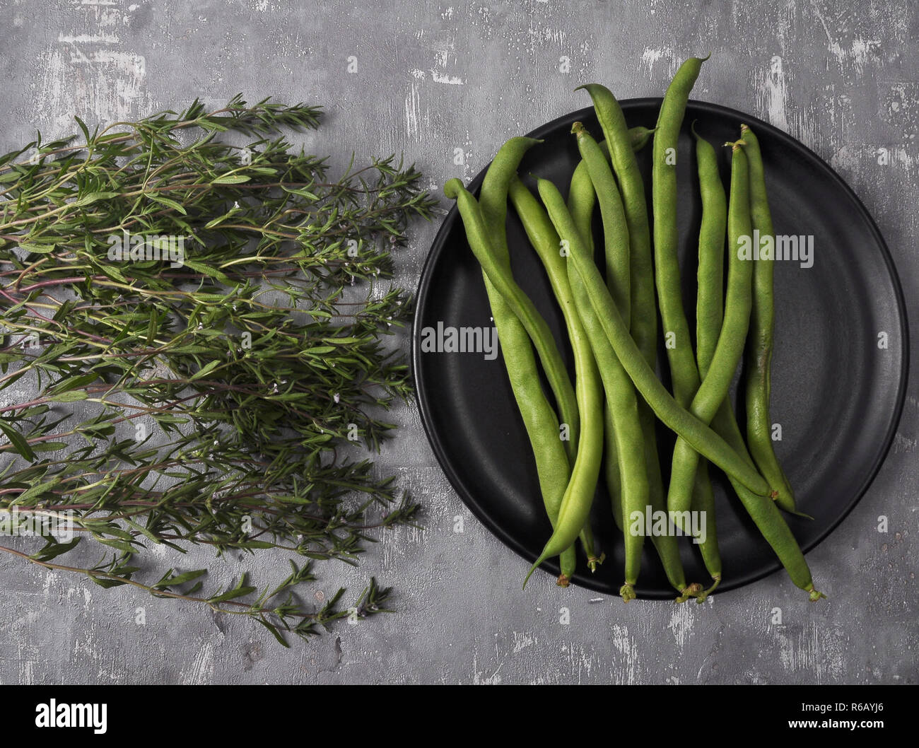 beans and savory on concrete Stock Photo