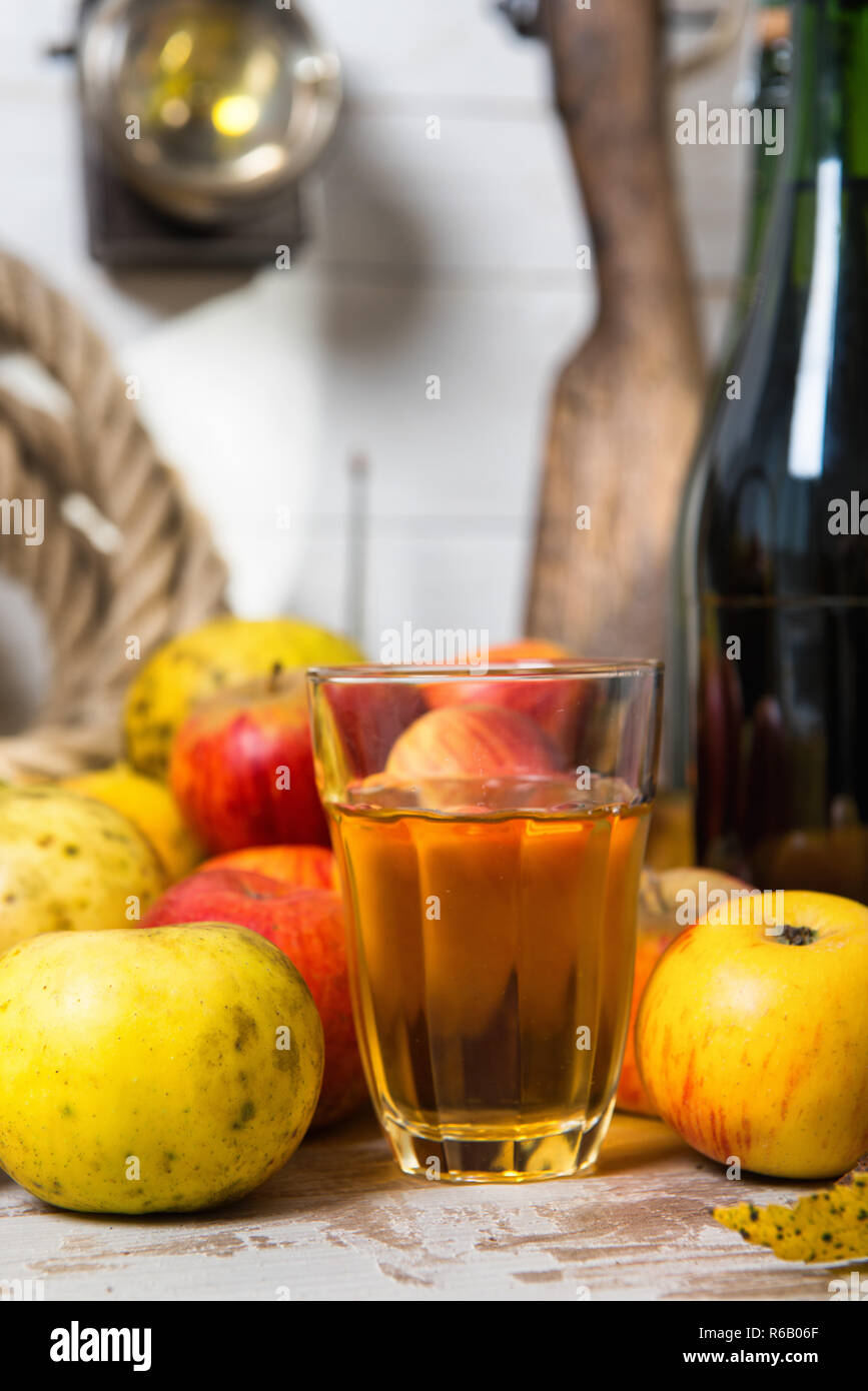 Download Glass And Bottles Of Cider With Red And Yellow Apples Stock Photo 227664375 Alamy Yellowimages Mockups