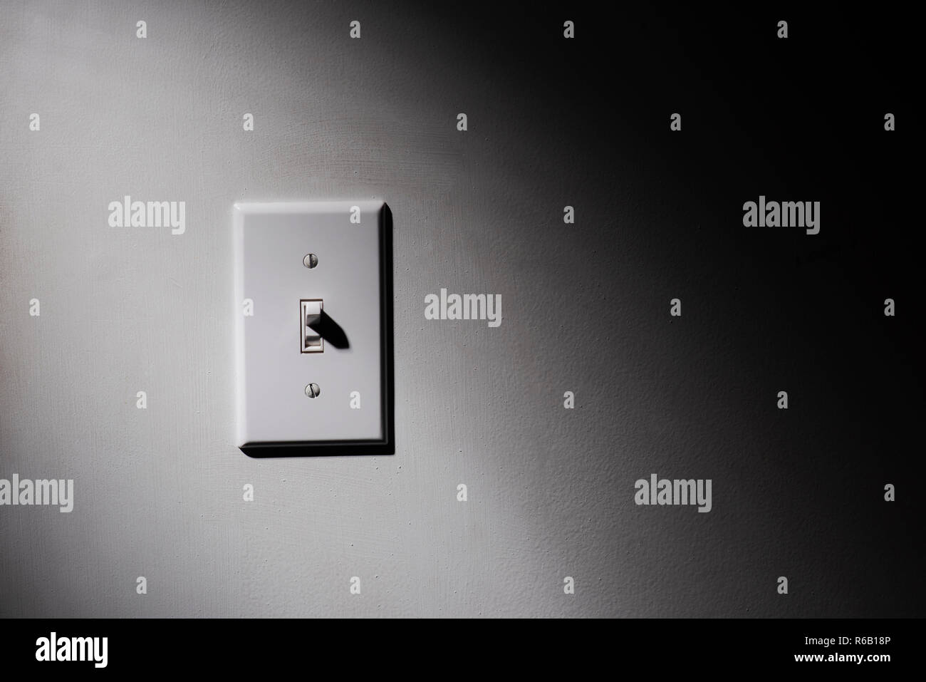 Light switch on the wall Stock Photo Alamy