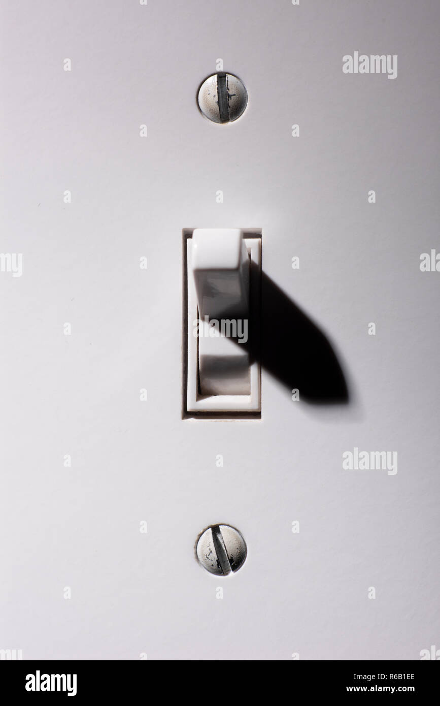 Light switch on the wall Stock Photo Alamy
