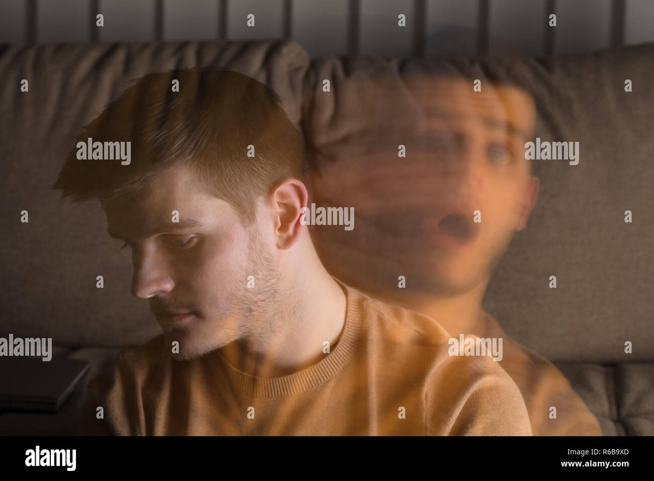 Contemplated Man At Home Stock Photo - Alamy