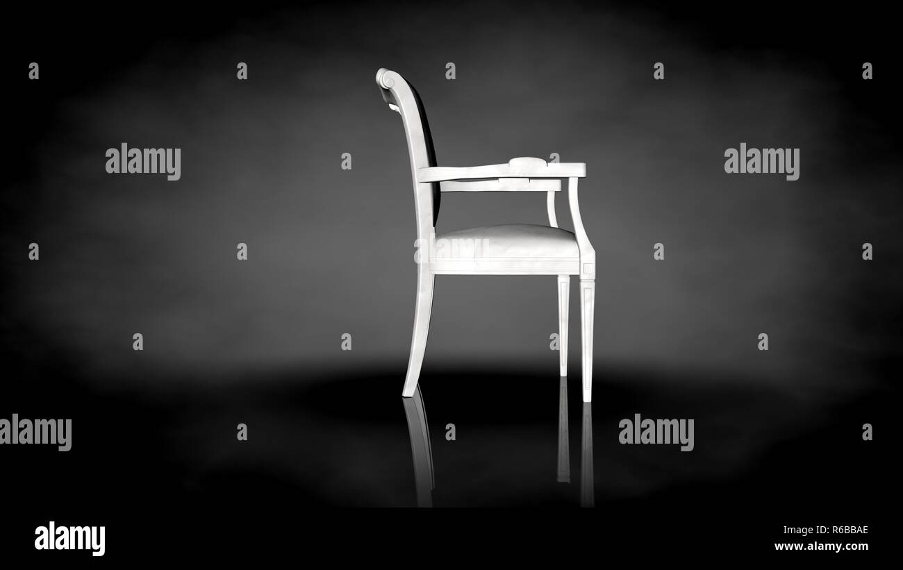 3d rendering of a white chair on a black background Stock Photo