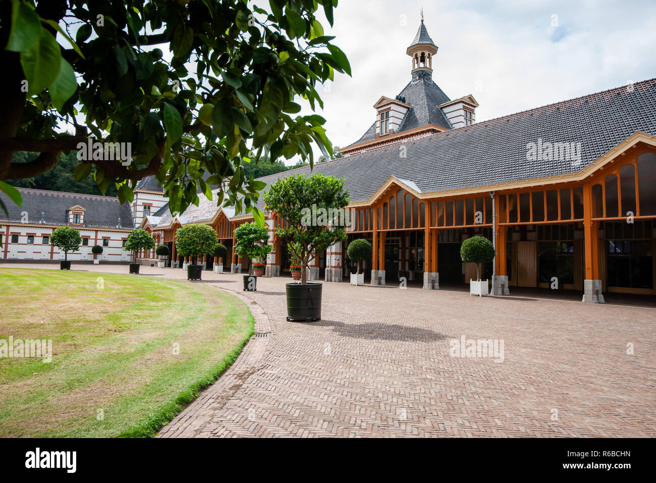 Typical traditional architecture based on the chalet or craft style at the former royal palace 'Het Loo' in Apeldoorn, the Netherlands Stock Photo