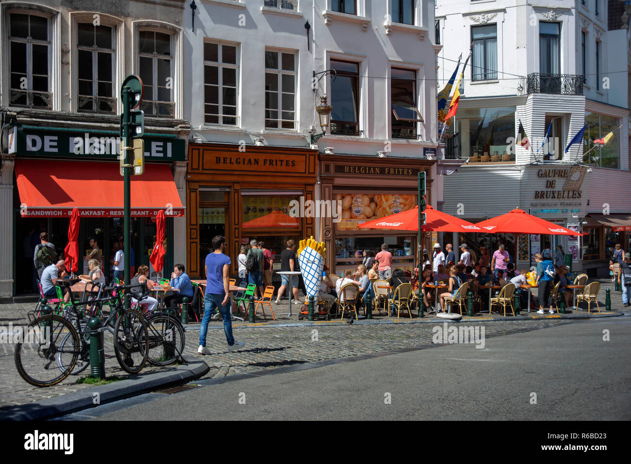Restaurants in Rue du Marché Aux Herbes street at Brussels city center. Stock Photo