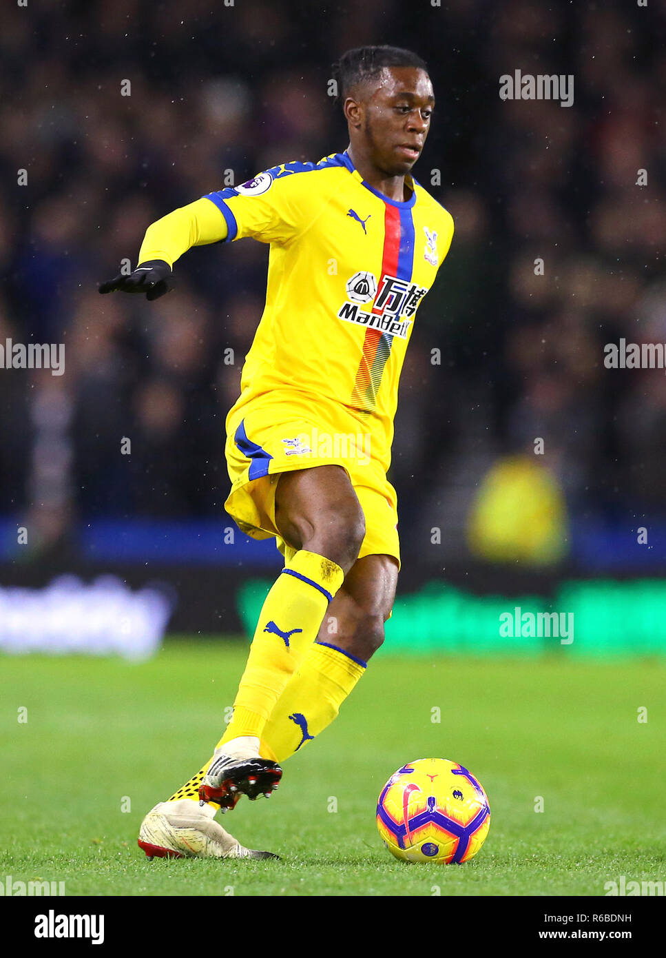 Crystal Palace's Aaron Wan-Bissaka during the Premier League match at the AMEX Stadium, Brighton. PRESS ASSOCIATION Photo. Picture date: Tuesday December 4, 2018. See PA story SOCCER Brighton. Photo credit should read: Gareth Fuller/PA Wire. RESTRICTIONS: No use with unauthorised audio, video, data, fixture lists, club/league logos or 'live' services. Online in-match use limited to 120 images, no video emulation. No use in betting, games or single club/league/player publications. Stock Photo