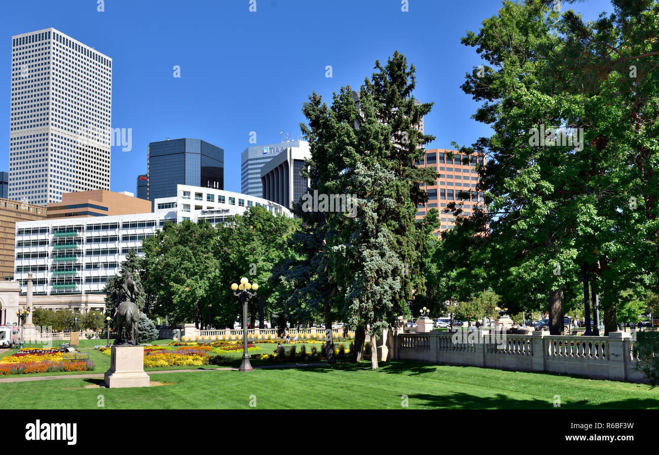 Downtown Denver skyline of tall buildings seen from Civic Center Park, downtown Denver, Colorado, USA Stock Photo
