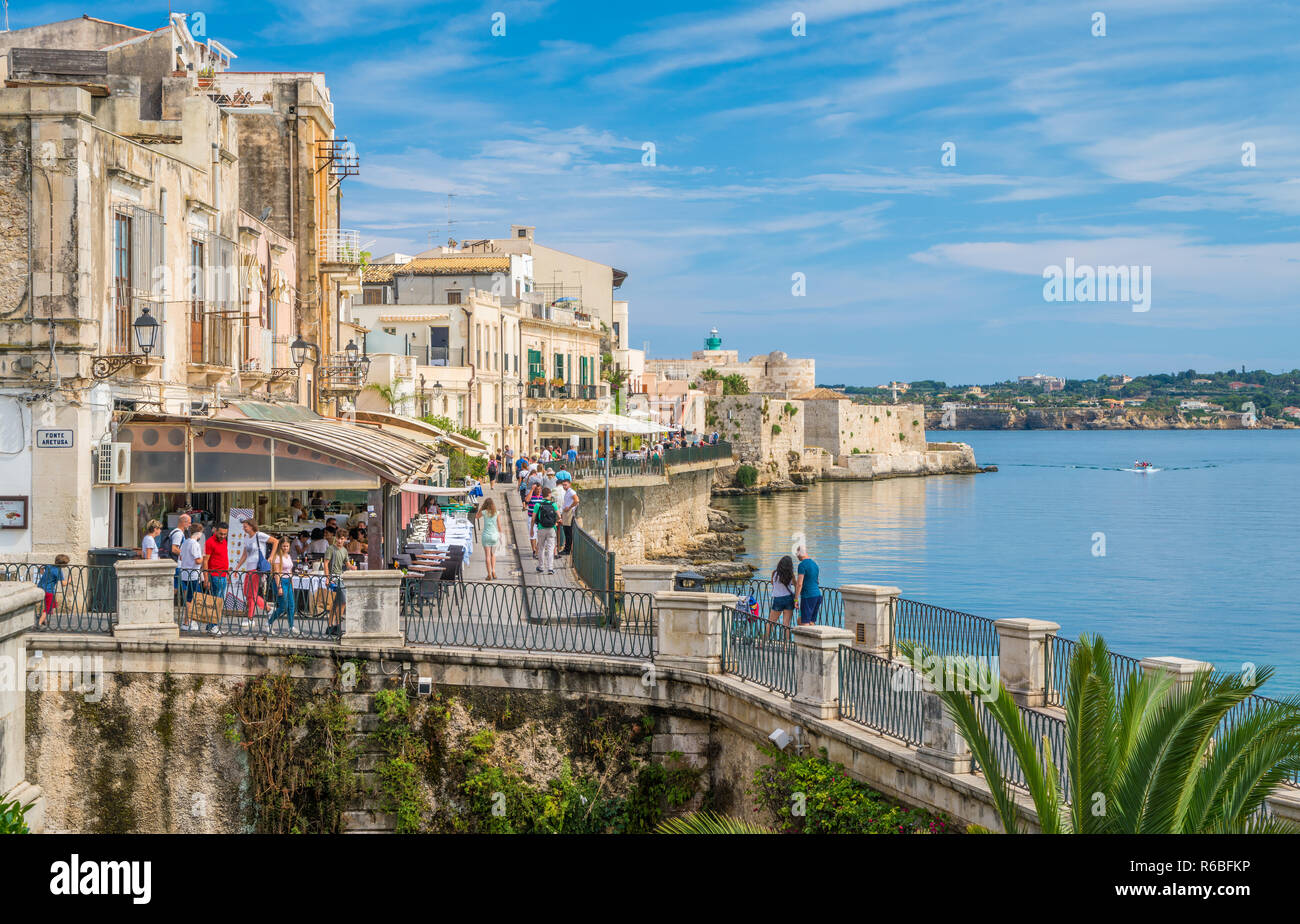 Siracusa waterfront in Ortigia with the castle in background, on a sunny summer day. Sicily, southern Italy. Stock Photo