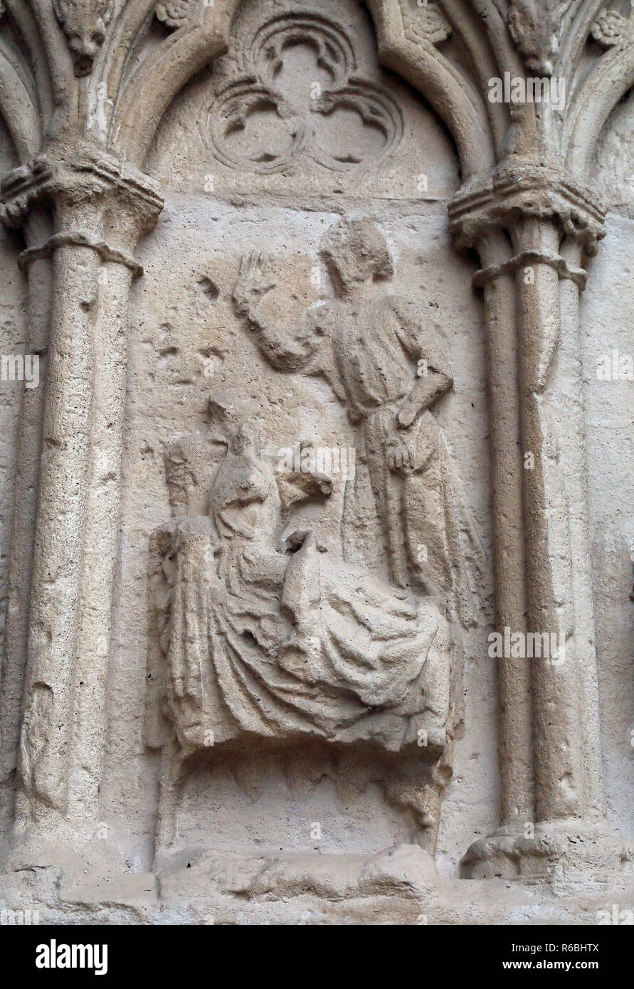 Stone carvings at the 13th century entrance to cathedrale notre dame, Enclave Notre Dame, Saint Omer, Pas de Calais, Hauts de France, France Stock Photo