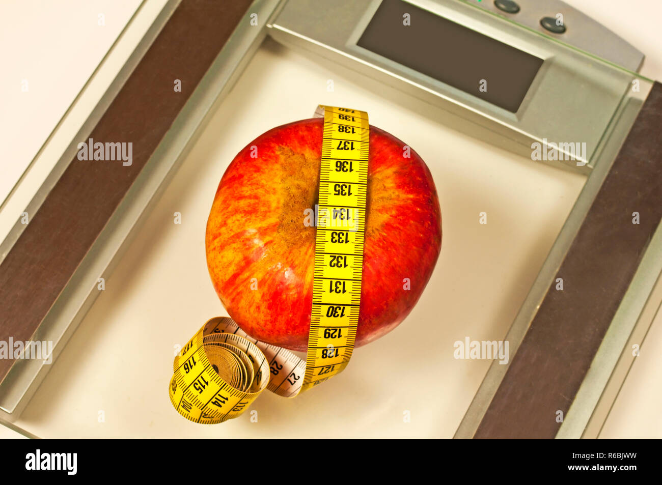 Bathroom Scales With Measure And Apple Stock Photo Alamy