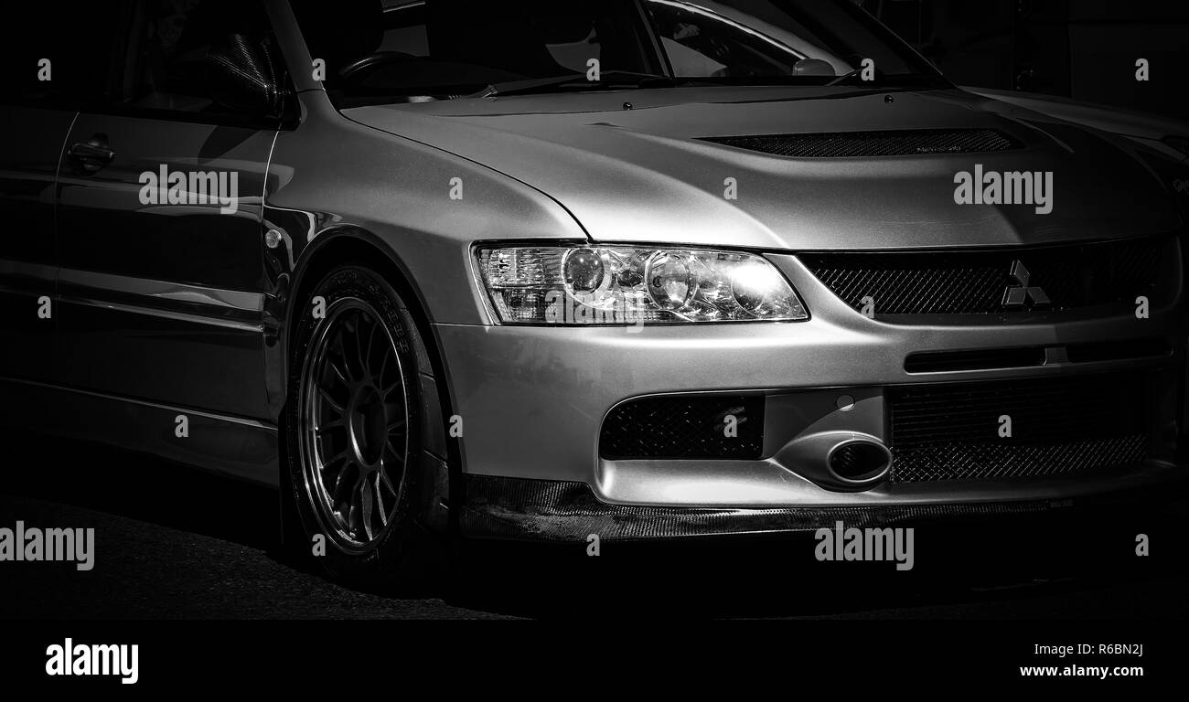 The front of a carbon fibre Japanese Mitsubishi Evo sports car. Stock Photo