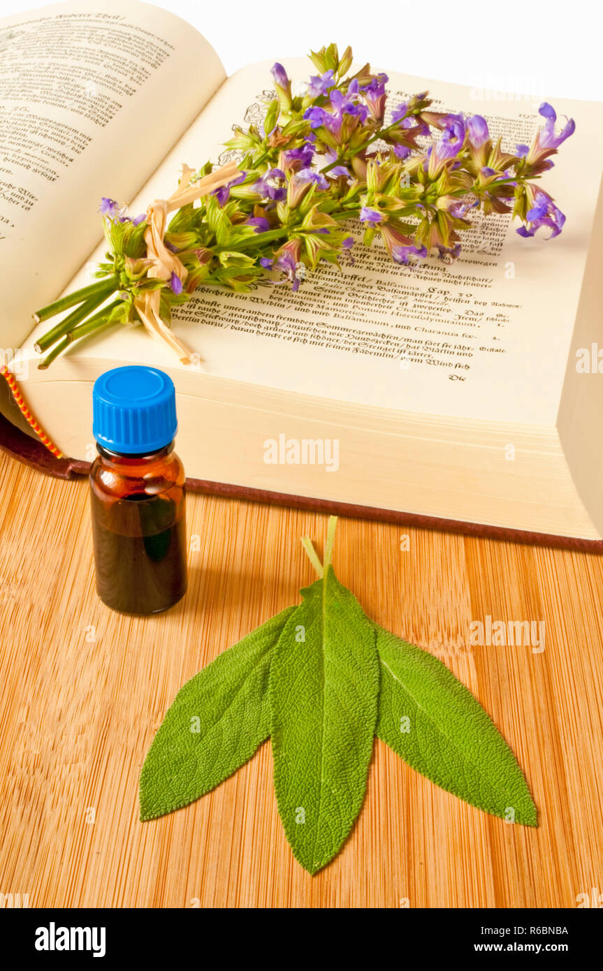 Sage With Herbal Tincture And Medieval Book Stock Photo Alamy