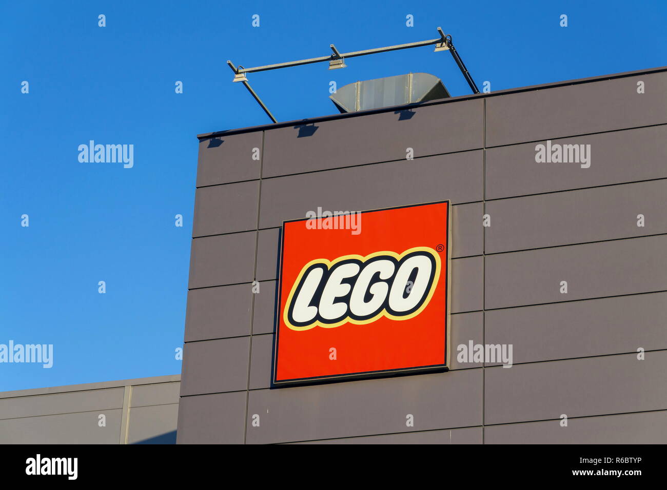 KLADNO, CZECH REPUBLIC - DECEMBER 4 2018: The Lego Group company logo on production factory building on December 4, 2018 in Kladno, Czech Republic. Stock Photo