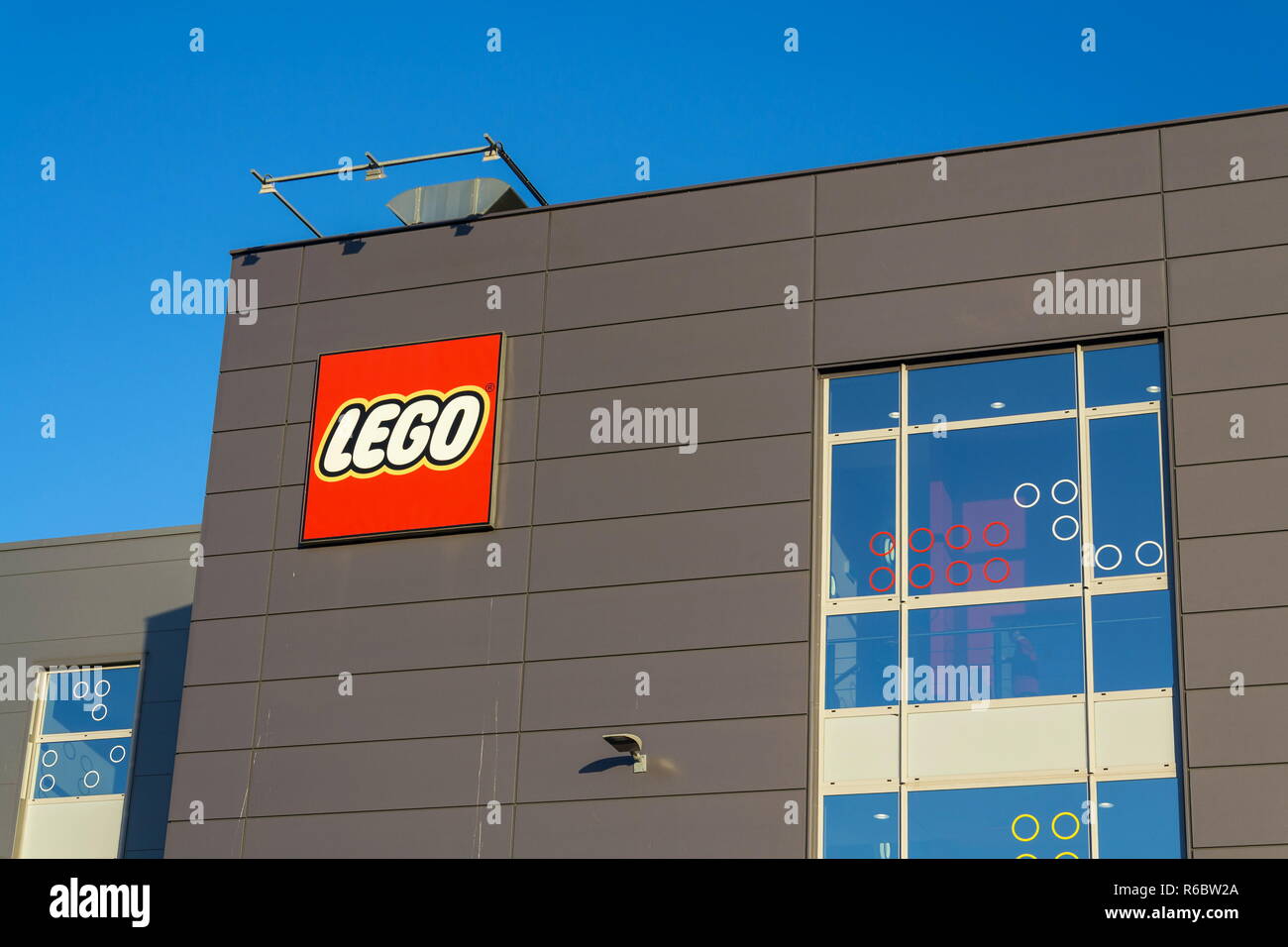 KLADNO, CZECH REPUBLIC - DECEMBER 4 2018: The Lego Group company logo on production factory building on December 4, 2018 in Kladno, Czech Republic. Stock Photo