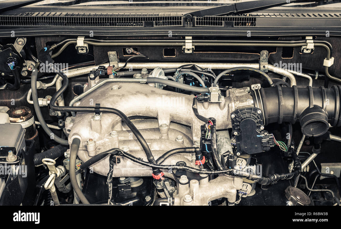 Automobile engine with its opened hood (Pajero-4 v6 3L) Stock Photo