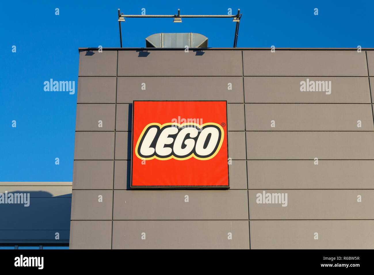 KLADNO, CZECH REPUBLIC - DECEMBER 4 2018: The Lego Group company logo on production factory building on December 4, 2018 in Kladno, Czech Republic. Stock Photo