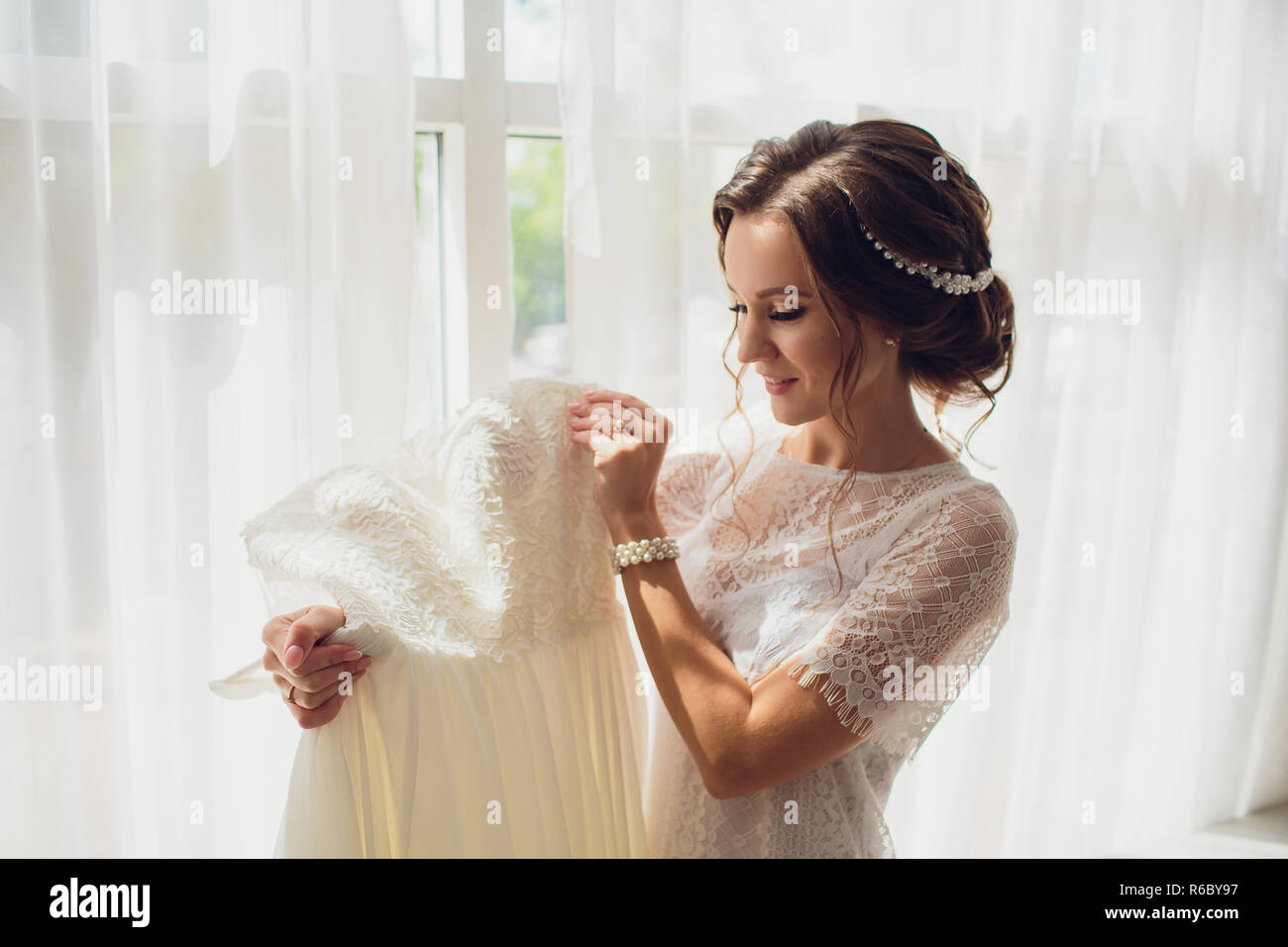 Woman in silk dressing gown hires stock photography and images Alamy