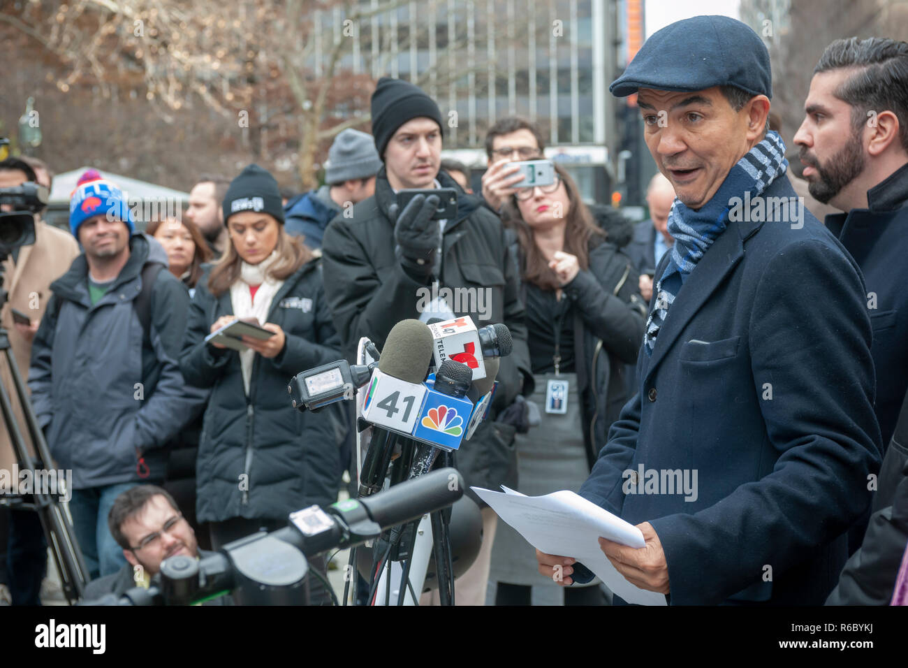 New York City Council Member Ydanis Rodriguez, right, with other Council Members and transportation supporters at a news conference on Wednesday, November 28, 2018 on the steps of NY City Hall discussing pending legislation which would legalize electric scooters and e-bikes on the streets of the city.  (Â© Richard B. Levine) Stock Photo