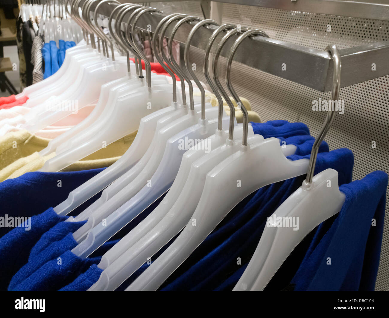 Fragment hangers for clothing in the store Stock Photo
