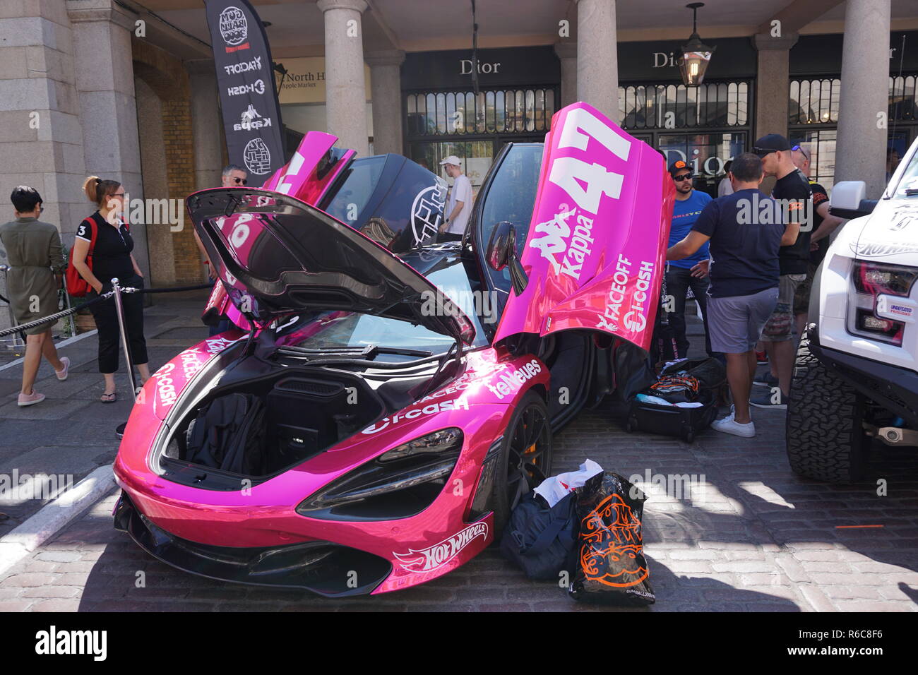 McLaren 720S wrapped in pink chrome on display in Covent Garden, London for the start of the 2018 Gumball 3000 Rally from London to Tokyo. Stock Photo