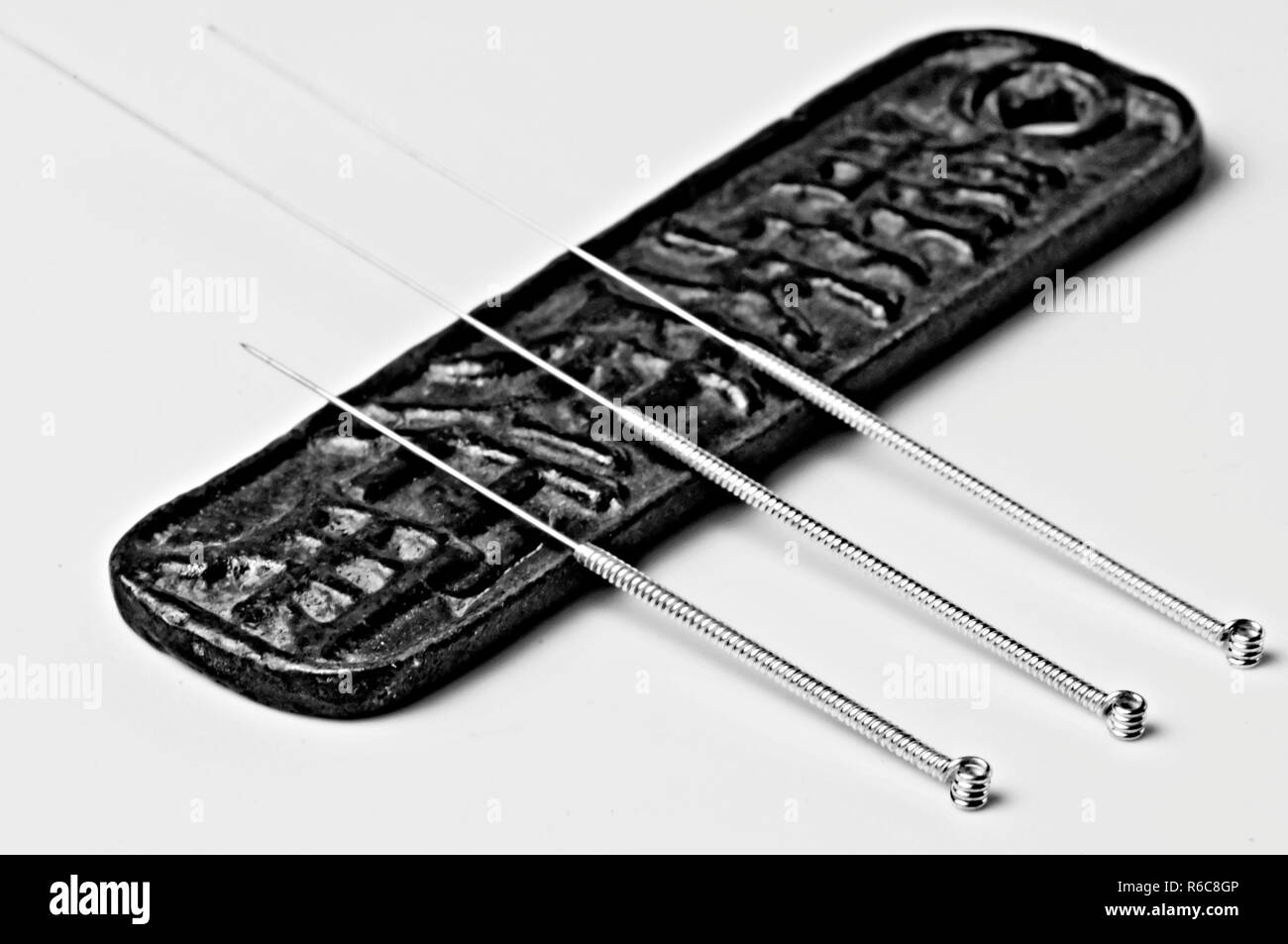 Acupuncture needles antique chinese coin hires stock photography and