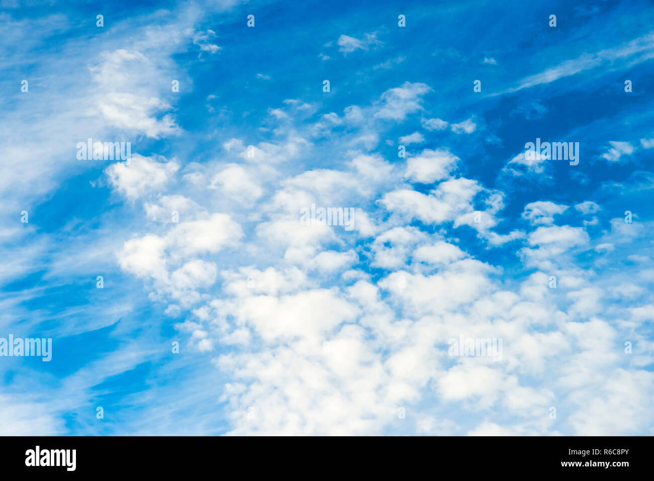 Blue Sky With Layers Of Clouds Stock Photo - Alamy