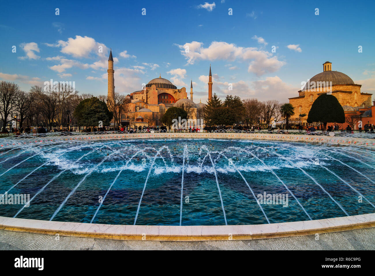 Hagia Sophia (Turkish: Aya Sofya) is a former Orthodox patriarchal church, later a mosque, and now a museum in Istanbul, Turkey. Fountains and blue po Stock Photo