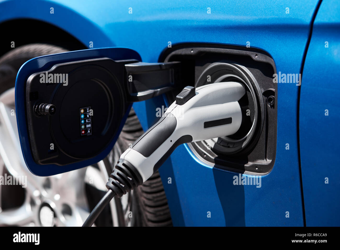 Charging an electric car or plug in hybrid Stock Photo