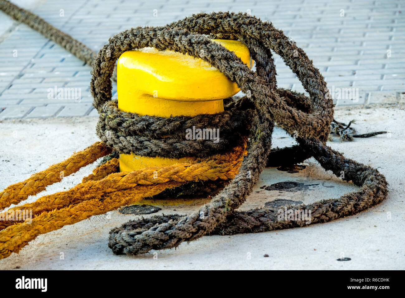 Bollard With Mooring Lines Stock Photo Alamy