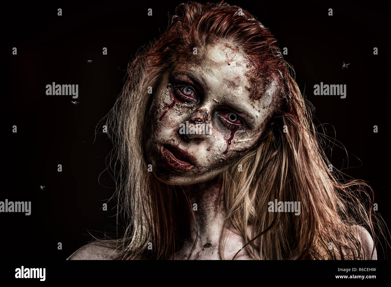 girl zombie with flies headshot Stock Photo