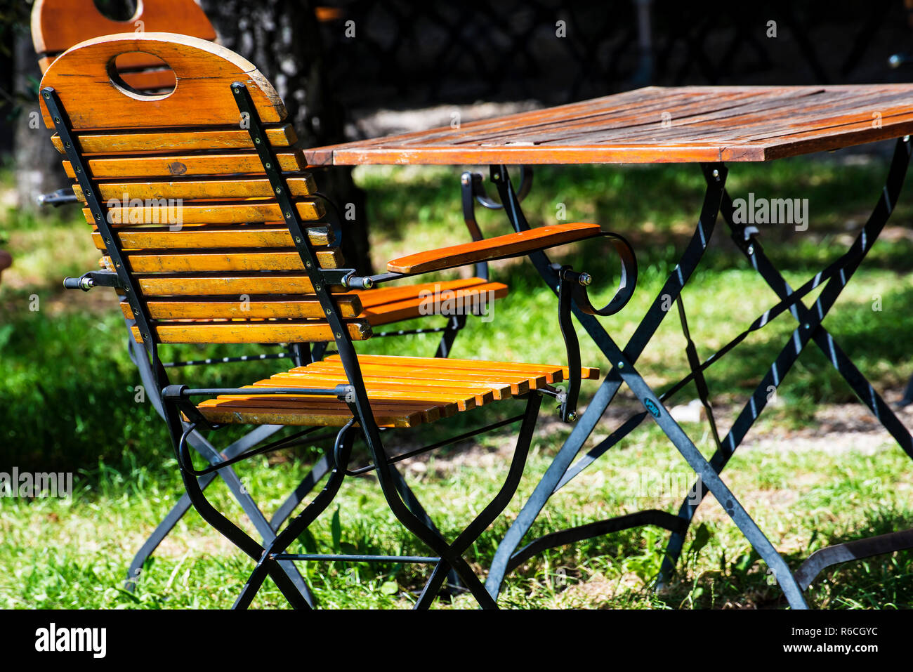 German Beer Garden With Wooden Furniture Stock Photo Alamy