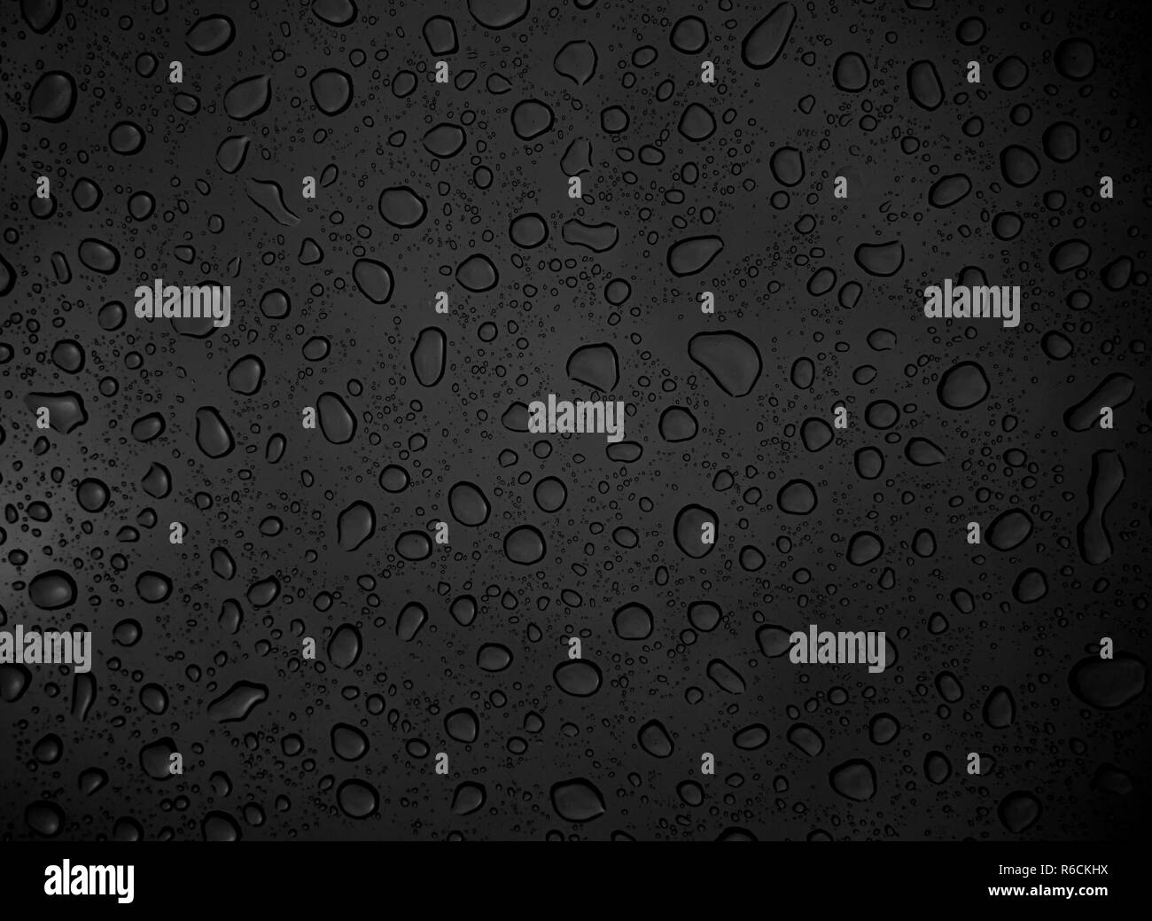 black background with water drops Stock Photo