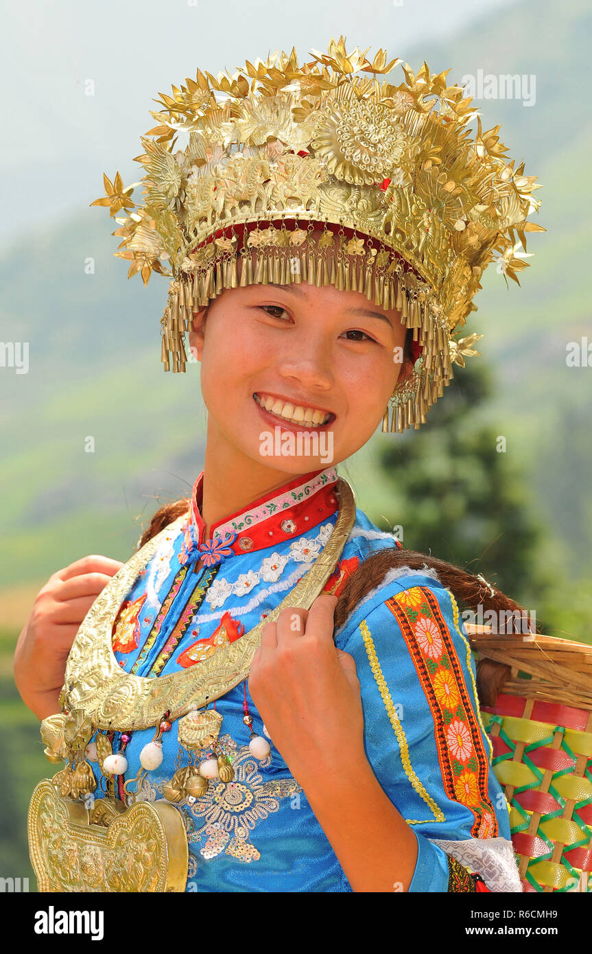 China, Guangxi Province, Guilin, Girl With Traditional Dress At
