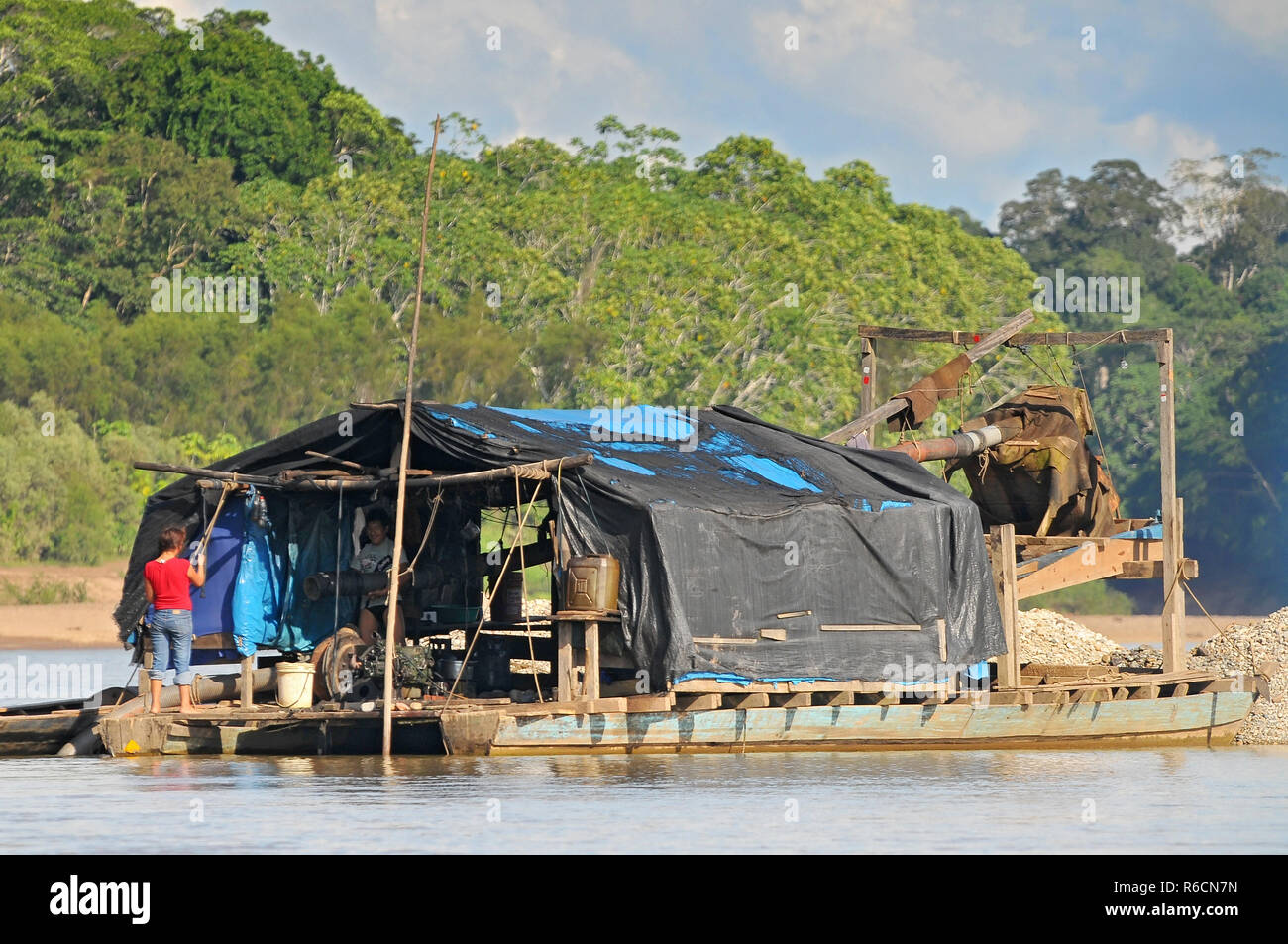 Peru, Amazon Rainforest, Gold Mining In The Middle Of The River In