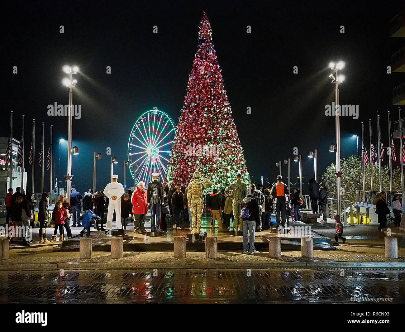 National Harbor Christmas tree with Ferris wheel in background Stock