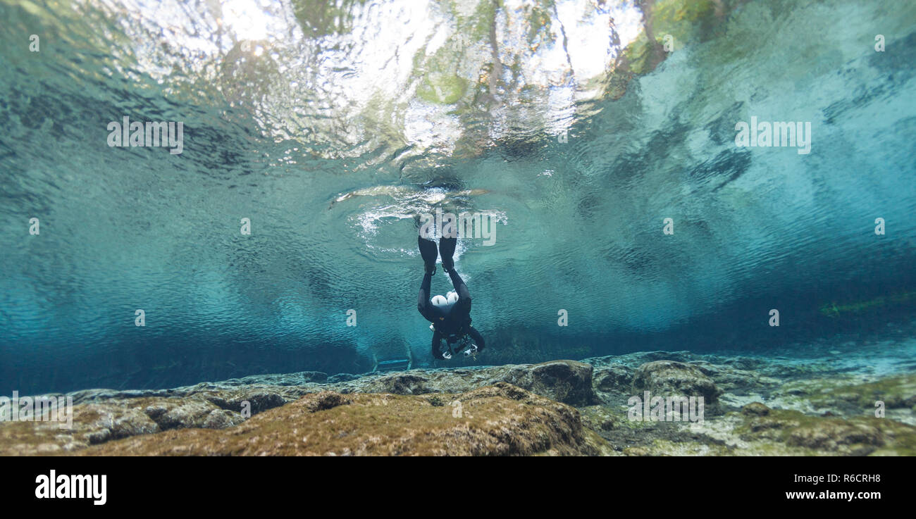 divers underwater caves diving Ginnie Springs Florida USA Stock Photo