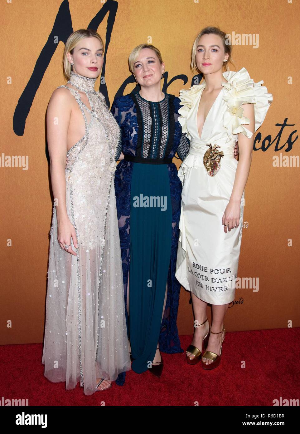 New York, NY, USA. 4th Dec, 2018. Margot Robbie, Josie Rourke, Saoirse Ronan at arrivals for MARY QUEEN OF SCOTS Premiere, The Paris Theater, New York, NY December 4, 2018. Credit: RCF/Everett Collection/Alamy Live News Stock Photo